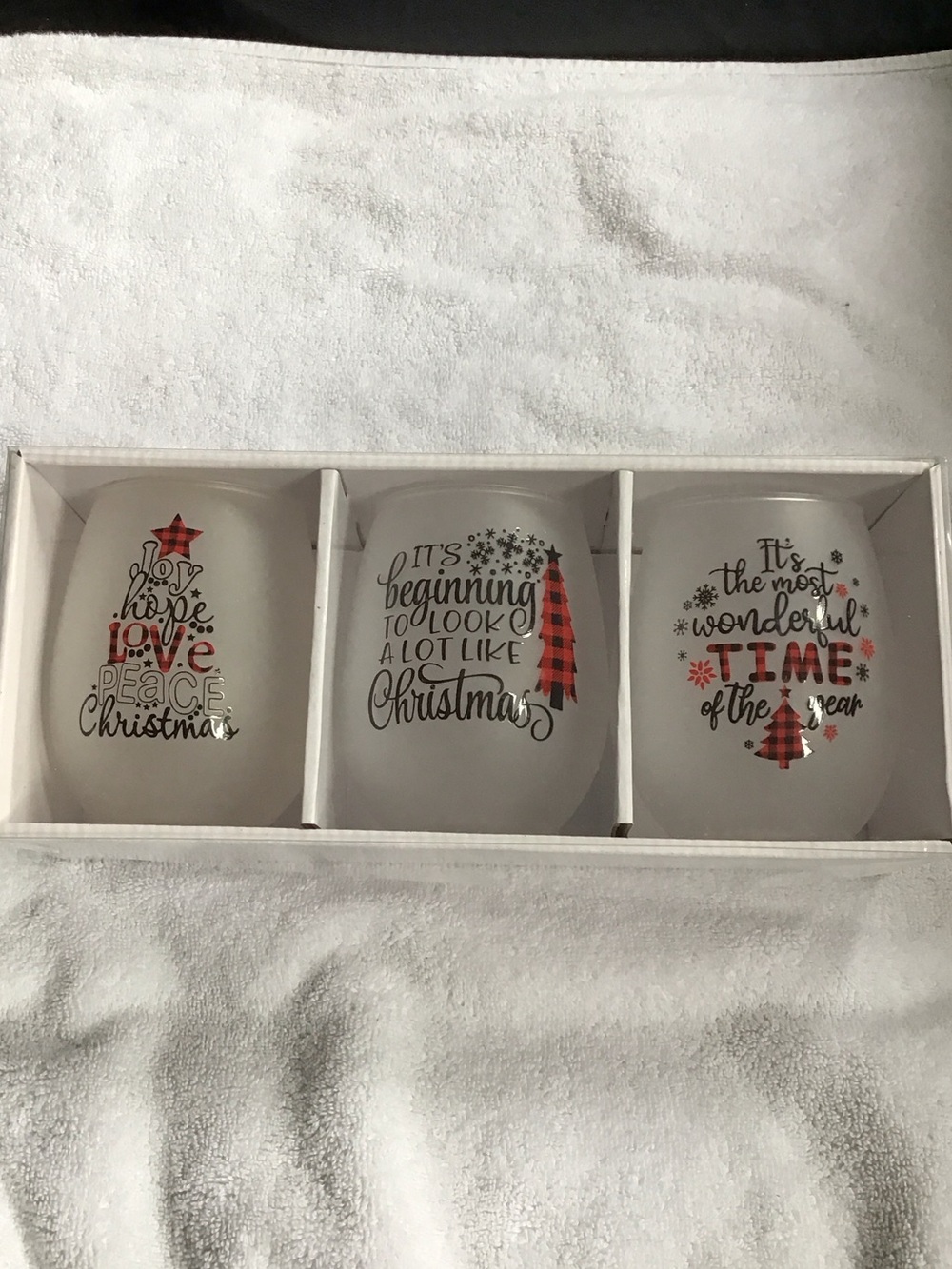 New in box three frosted stemless Christmas wine glasses